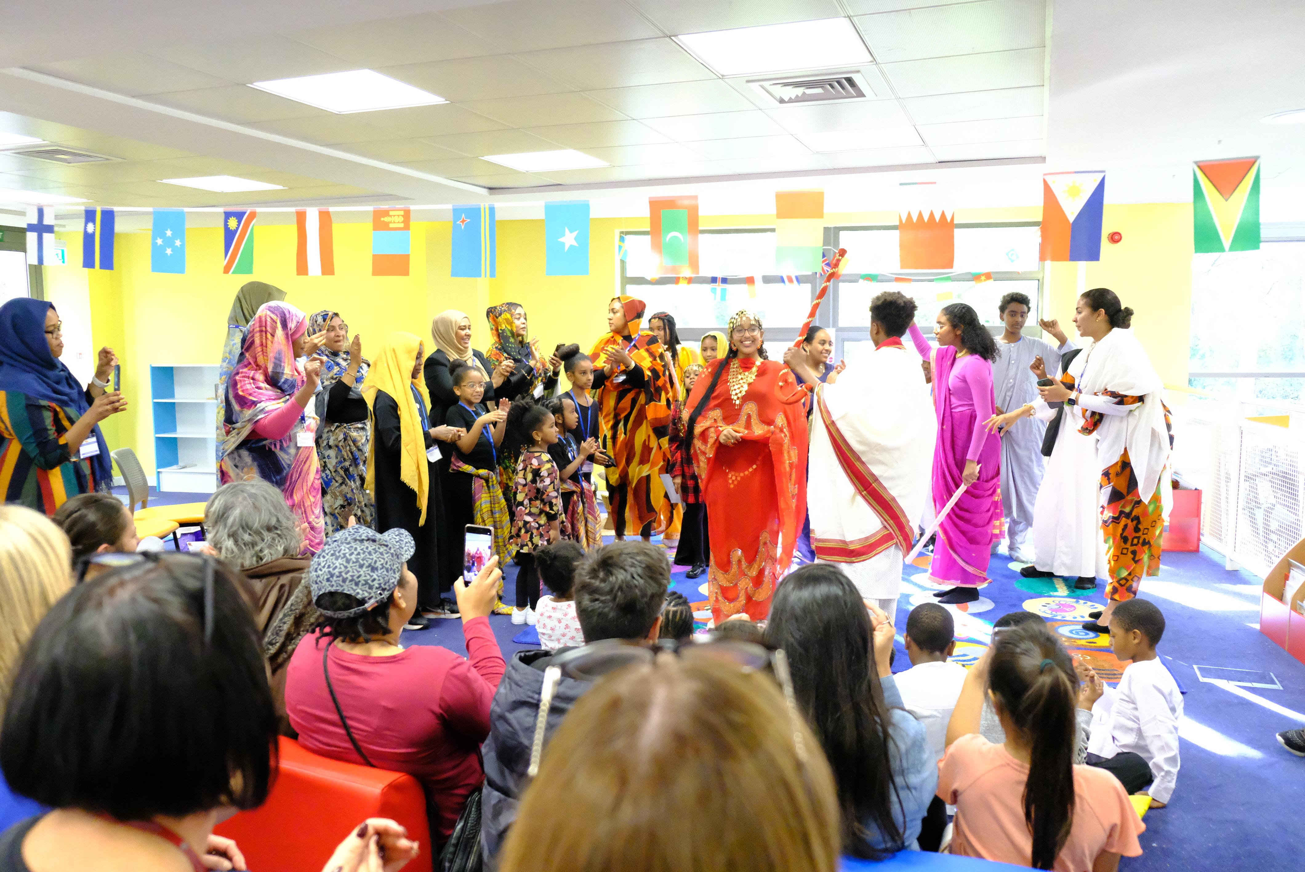 Families dancing at the EAL event. 